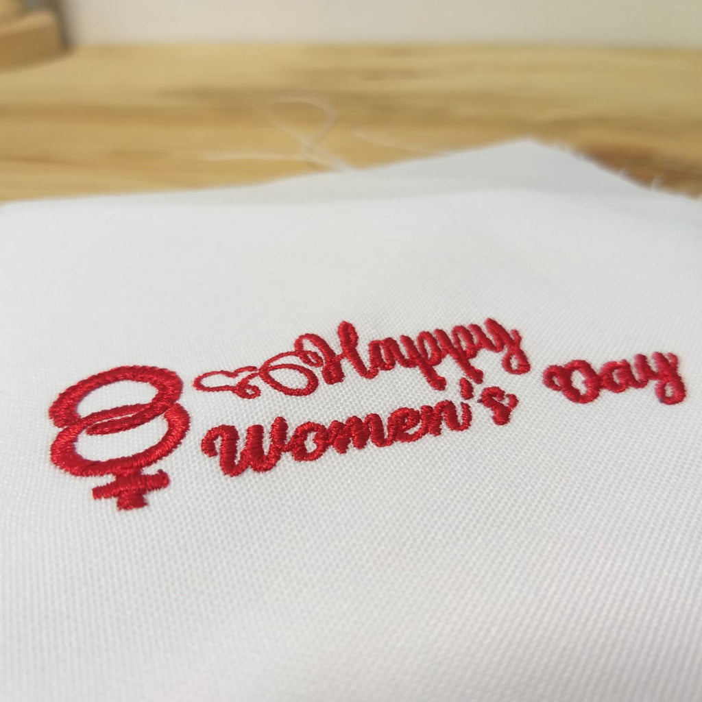 Feliz Día de la Mujer - Texto con símbolos en rojo - Diseño de bordado a máquina